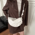 White dumpling-shaped leather crossbody bag with knot strap and round bead detail - White