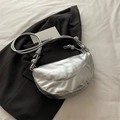 Chic silver half-moon crossbody bag with metallic finish and knotted strap detail - Silver