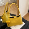 Bright yellow faux suede underarm bag with a mini pouch charm and a mirror reflection - Yellow