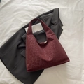 Bolso tote rojo vino oscuro con estampado de leopardo sobre un blazer gris - Rojo