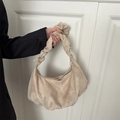 Beige corduroy crescent bag with pleated cloud handle and minimalist half-moon silhouette - White