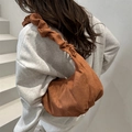 Caramel brown ruched dumpling bag in soft suede-like texture with ruffled shoulder strap - Brown