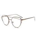 Primer plano de montura de gafas metálica en color bronce con diseño de doble puente frontal - Montura Leonada (2103)