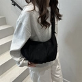 Minimalist black crescent hobo tote bag with pleated design and wide shoulder strap - Black