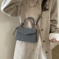 Deep grey leopard print crossbody bag with knotted handle and elegant gold hardware - Gray