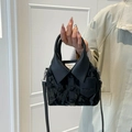 Minimalist black shirt-shaped velvet handbag with button detail and crossbody strap - Black