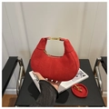 Detail view of red suede hobo bag with golden zipper and detachable shoulder strap - Red