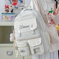 White multi-pocket student backpack with pompom charm in Korean aesthetic style - With Charm / White