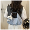 Detail showing light blue jacquard tote bag with a cute white cloud plush pendant - With Cloud Charm / Blue