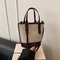 Klassieke beige canvas emmer tas met bruine lederen afwerking en handvatten - Bruin