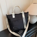 Zwarte canvas lunchtas met witte EVES CAMIER banden en verstelbare schouderriem - Zwart