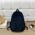 Minimalist black nylon large capacity backpack with drawstring side pockets and zip pocket - Black