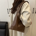 Brown faux leather shoulder tote bag with silver studs decoration and retro design - Coffee