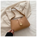 Detail of camel PU leather shoulder bag with a gold gourd-shaped rotating metal clasp - Dark Khaki