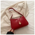 Detail of red leather shoulder bag featuring a vintage golden gourd clasp and adjustable strap - Red