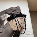 Crossbody bucket bag with cherry print on white background and black leather straps - Black