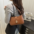 Brown leather crossbody square bag featuring a vintage golden gourd clasp and adjustable strap - Brown