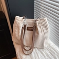 Creamy white corduroy tote bag with brown leather strap and silver chain detail - White