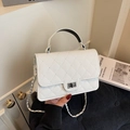 Elegant white quilted crossbody bag with silver twist lock and woven chain strap - White