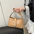 Vintage camel PU leather crossbody bag with distinctive gold buckle and adjustable strap - Khaki