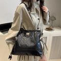 Large black quilted tote bag with gold chain strap for stylish office commuting - Black