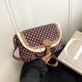 Pink polka dot canvas crossbody bag with lace trim and brown leather strap detail - Red