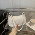 Chic white snake-embossed faux leather underarm bag with gold zipper and stylish half-moon shape - White