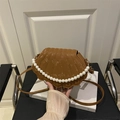 Brown shell-shaped crossbody bag with snake-skin texture and white pearl handle chain - Brown