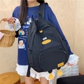 Black cartoon duck backpack for girls featuring yellow 3D duck feet and beak details - Black