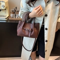 Deep brown woven leather tote bag with vintage gold buckle and adjustable strap - Brown