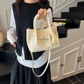 Creamy beige woven texture handbag with silver buckle and adjustable shoulder strap - Beige