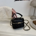 Mini black quilted leather box bag with gold-tone chain strap and top handle design - Black