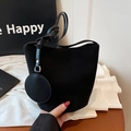 Retro black faux suede bucket bag with matching round coin purse and long shoulder strap - Black