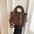 Brown quilted crossbody bag with top handle and gold key charm accessory - Brown (With Charm)