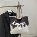 Grande borsa da spiaggia in tela sfumata bianca e nera con stampa Summer e frange - Nero