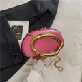 Pink semi-round leather chain bag with large gold metal handle and slim shoulder strap - Pink