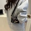 Mini black crossbody bag with red cherry print and golden metal bar detail - Black Mini Bag With Cherry Print