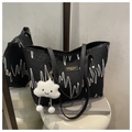 Detail of striped canvas tote with wave embroidery and cute plush cloud pendant charm - Black With Pendant