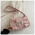 Detail of pink faux leather bag with silver metal bow buckle and pleated design texture - Pink