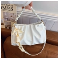 Detail of white pleated cloud bag featuring large pearl handle and beige silk scarf decor - Off White