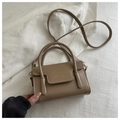 Detailed shot of khaki PU leather bag with gold FASHION letter buckle and top handle - Dark Khaki