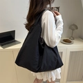 Large black nylon cloud tote bag for women showing spacious interior for daily commute - Black