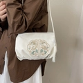 Sac à bandoulière en soie beige avec broderie florale et élégant pompon blanc - Beige Sans Pendentif