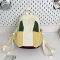 Women's college style contrast nylon backpack in cream green and yellow patchwork - Small / Off White