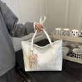 Large white tote bag with embossed texture and colorful embroidery details - White with Pendant