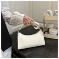 Close-up of white glossy patent leather baguette bag with minimalist metal zipper detail - Glossy White