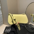 Lime yellow pebble leather underarm bag with knotted strap and Fashion & Bags print - Yellow