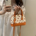 Mini cherry print bucket bag with orange leather handles and detachable shoulder strap - Orange