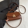 Retro brown PU leather small square bag with golden curved metal clasp and slim strap - Tan