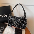 Borsa a tracolla alla moda con paillettes nere e argento e tracolla annodata - Argento